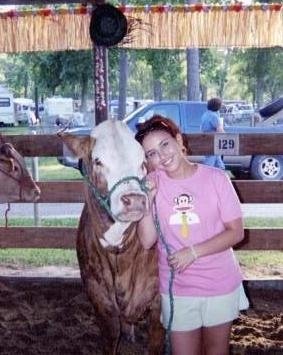 Everyone needs a pet cow.  Faith was my scramble heifer.  Yes, I chased after cows with a halter in a calf scramble.  What?